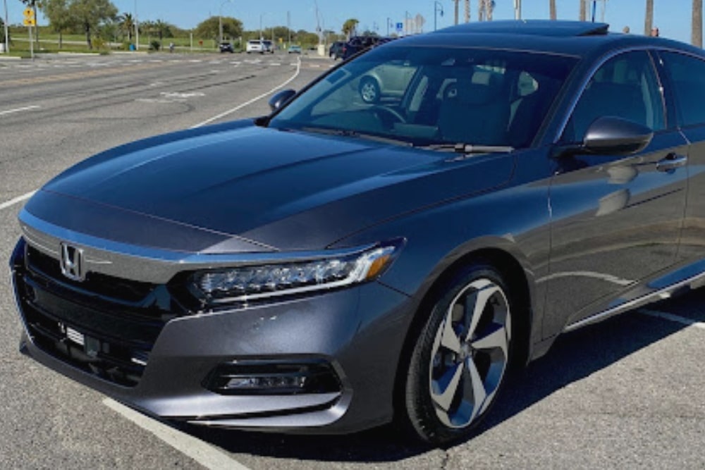 Japanese Vehicle Service in Killeen TX At First Choice Automotive Repair. Close-up view of a Honda car parked outside an auto repair shop
