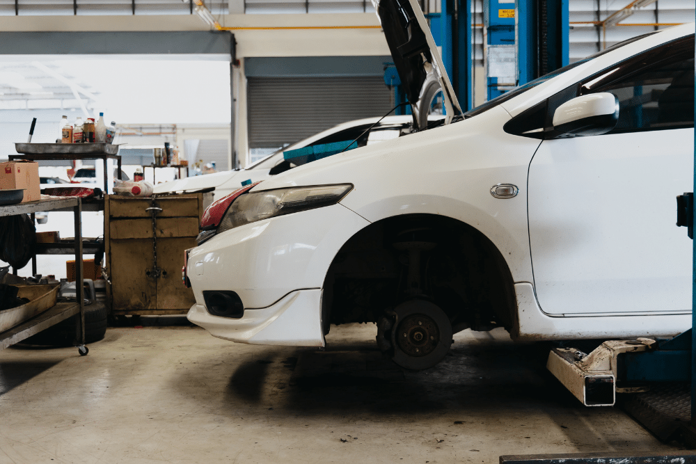 Brake Repair, Vehicle Inspection in Killeen TX at First Choice Automotive Repair. Close-up view of a vehicle in an auto repair shop during a brake repair